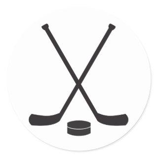 Hockey Sticks and Puck Classic Round Sticker