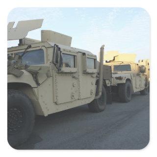 Humvees sit on the pier at Morehead City Square Sticker