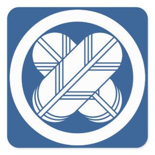 Intersecting hawk feathers in circle square sticker
