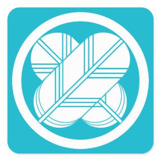 Intersecting hawk feathers with foot in circle square sticker