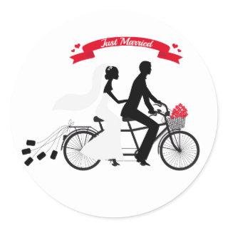 Just married bride and groom on tandem bicycle classic round sticker