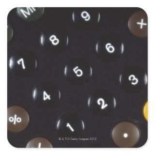 Keys on a calculator square sticker