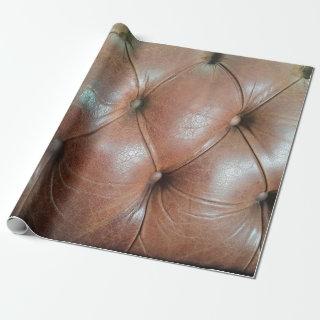 Light on brown leather sofa surface, textureabstra