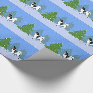 Long-haired Chihuahua or Papillon Decorating Tree