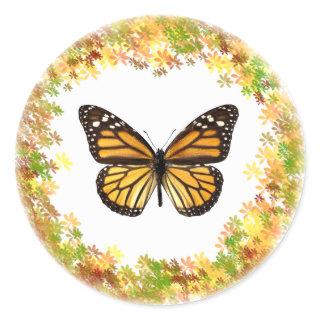 Monarch butterfly in frame of leaves classic round sticker