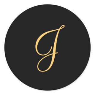 Monogram J, gold colored initial J on black, Classic Round Sticker