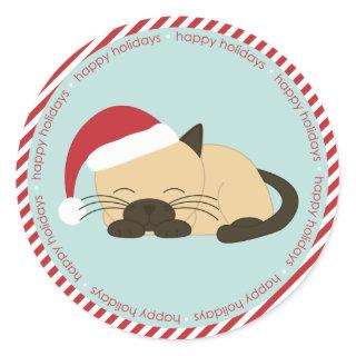 Napping Cat Wearing a Santa Hat Classic Round Sticker