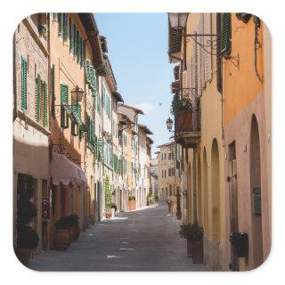 Narrow street with old facades in tuscany village square sticker
