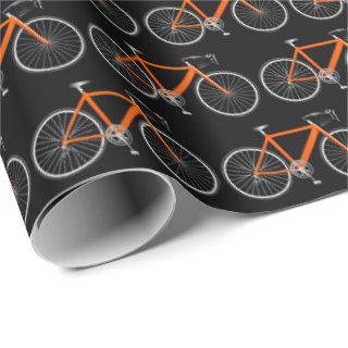 orange bicycle on black