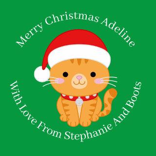 Orange Tabby Christmas Cat On Green