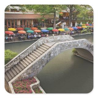 Outdoor cafe along River Walk and bridge over 2 Square Sticker