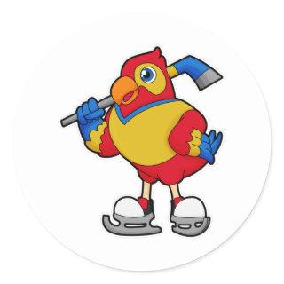 Parrot at Ice hockey with Ice hockey stick Classic Round Sticker