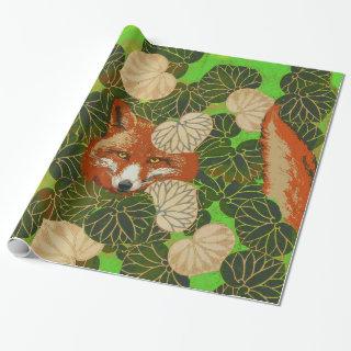 RED FOX AMONG THE GREEN LEAVES AND FOLIAGE