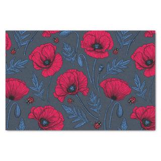 Red poppies and ladybugs on dark blue tissue paper