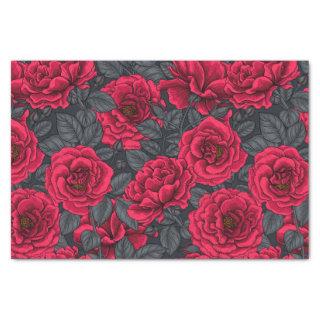 Red roses with gray leaves on black tissue paper