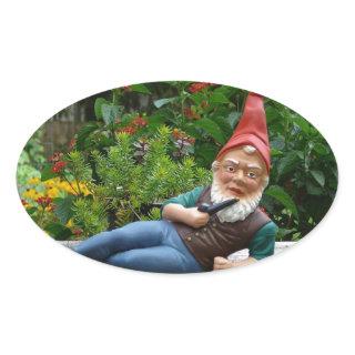 Relaxing Gnome with Santa Cap Oval Sticker