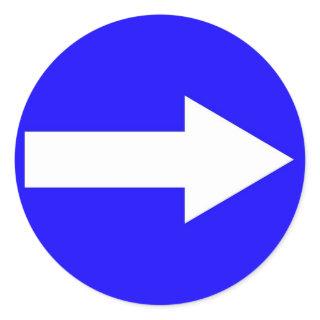 Round sticker with arrow on right