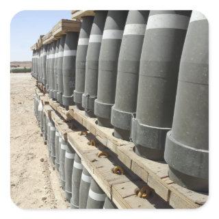 Rows of ammunition are stacked and prepped square sticker
