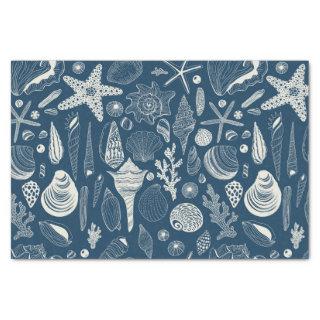 Sea shells on  dark blue tissue paper