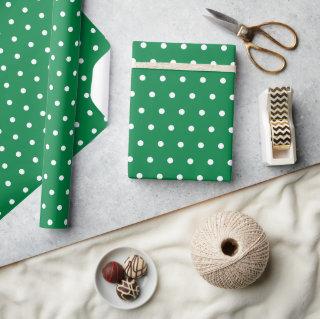 Simple white polka dots on Christmas green pattern