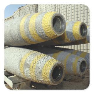 Six GBU-12 bombs sit in a rack Square Sticker