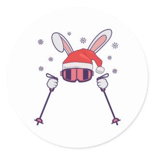 Skiing Santa Rabbit with Santa Hat and ski poles S Classic Round Sticker