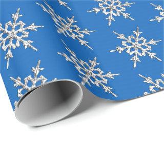 Snowflakes, silver crystals on cobalt blue