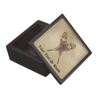 Snowshoes On Old Paper Gift Box