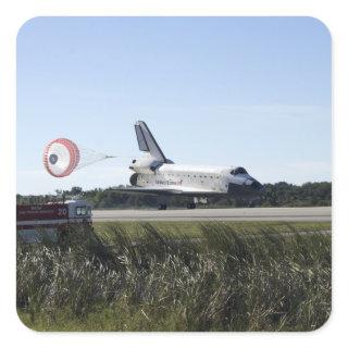 Space shuttle Atlantis unfurls its drag chute Square Sticker