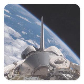 Space Shuttle Discovery backdropped by Earth Square Sticker