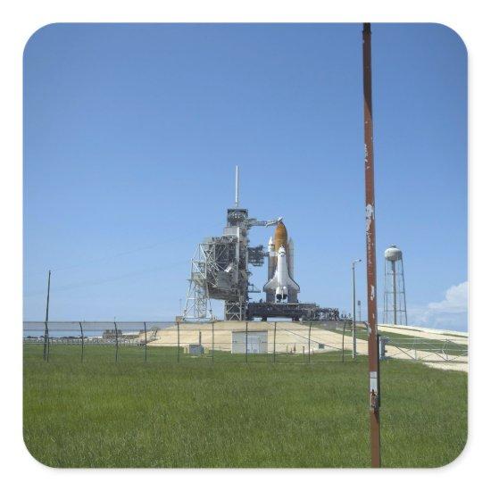 Space shuttle Endeavour is framed by a windsock Square Sticker