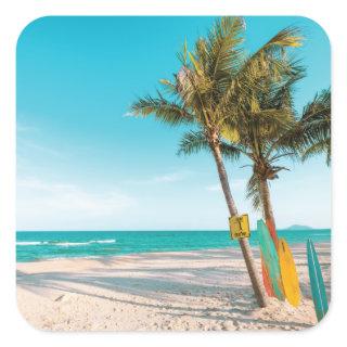 Surf boards on beach throw pillow square sticker