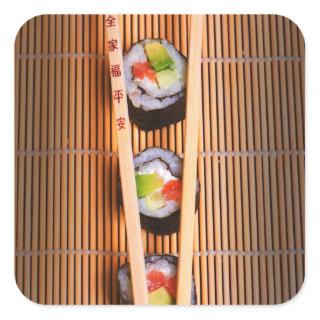 Sushi and wooden chopsticks square sticker