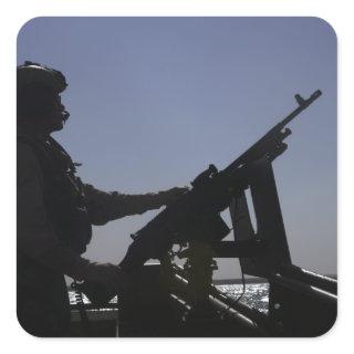 Technician manning an M240 machine gun in Iraq Square Sticker