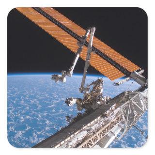 The Canadarm2 and solar array panel wings Square Sticker