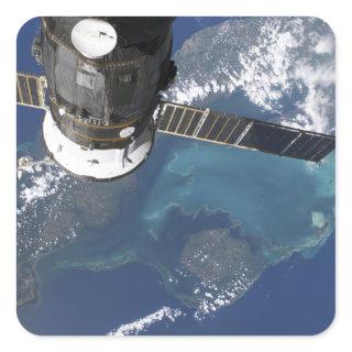 The docked Progress 22 spacecraft Square Sticker