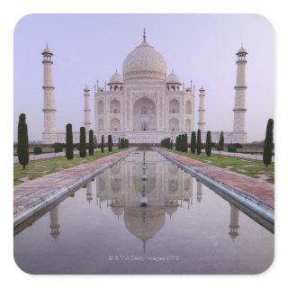 the Taj Mahal perfectly reflected in the pool in Square Sticker