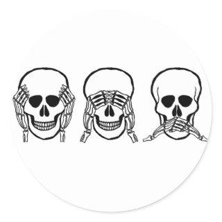 Three wise skulls, see, hear, speak no evil classic round sticker