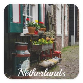 Traditional Dutch wooden shoes on street Square Sticker