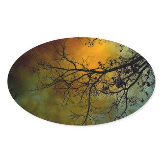 tree on a stormy morning oval sticker