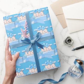 Twin baby boys in presents rapping paper