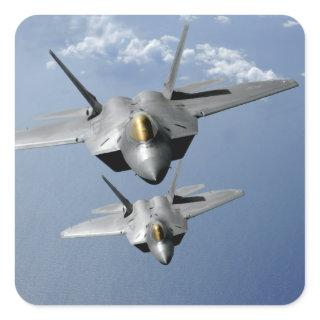 Two F-22 Raptors fly over the Pacific Ocean Square Sticker