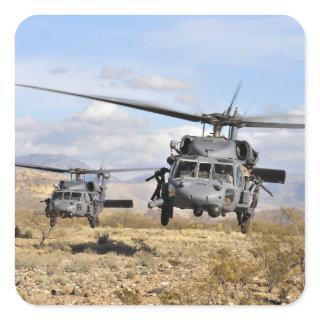 Two HH-60 Pavehawk helicopters preparing to lan Square Sticker