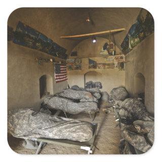 US Soldiers sleep in an abandoned mud house Square Sticker
