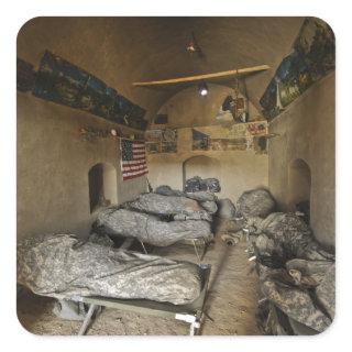 US Soldiers sleep in an abandoned mud house Square Sticker