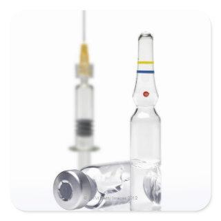 Vials containing medicine for injections and square sticker