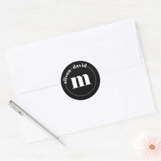 White circle with names and monogram black wedding classic round sticker