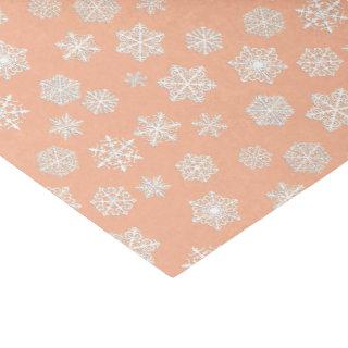 White snowflakes on a peach background tissue paper